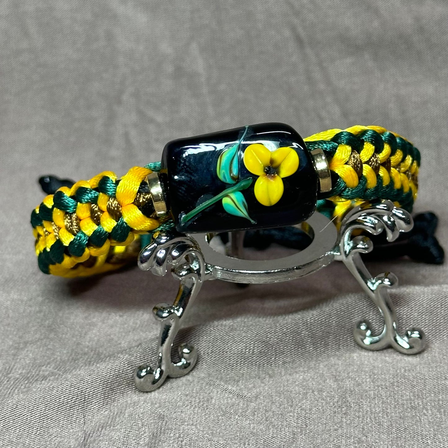 Yellow flower on green, yellow & tan cord - Dr. Jen Jitsu