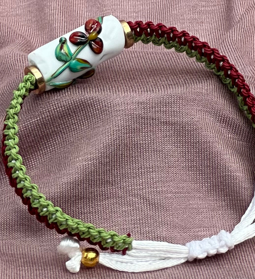 Dark Red flowers with a maroon & green cord - Dr. Jen Jitsu