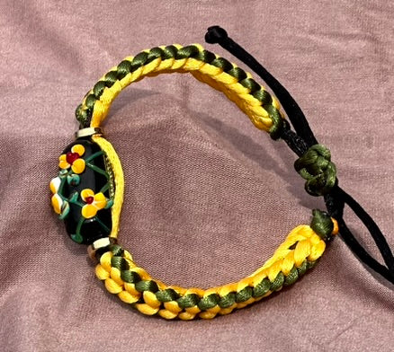 Yellow flowers on yellow & green cord - Dr. Jen Jitsu