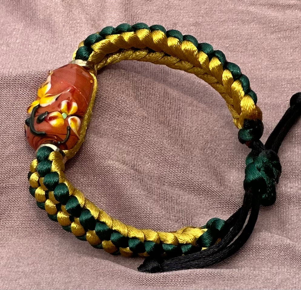 Yellow flowers on yellow & green cord - Dr. Jen Jitsu