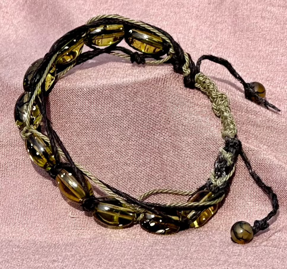 Bracelet featuring translucent beads with flecks of white - Dr. Jen Jitsu