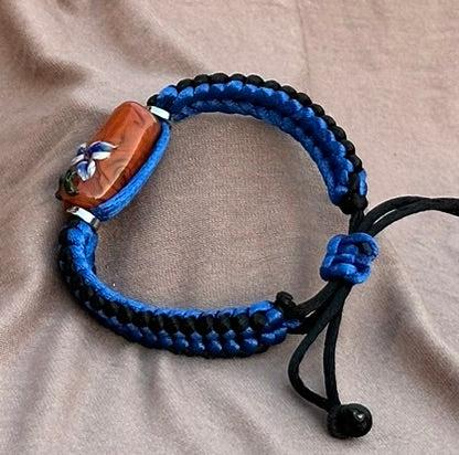 Stricking blue flowers on blue & black cord - Dr. Jen Jitsu