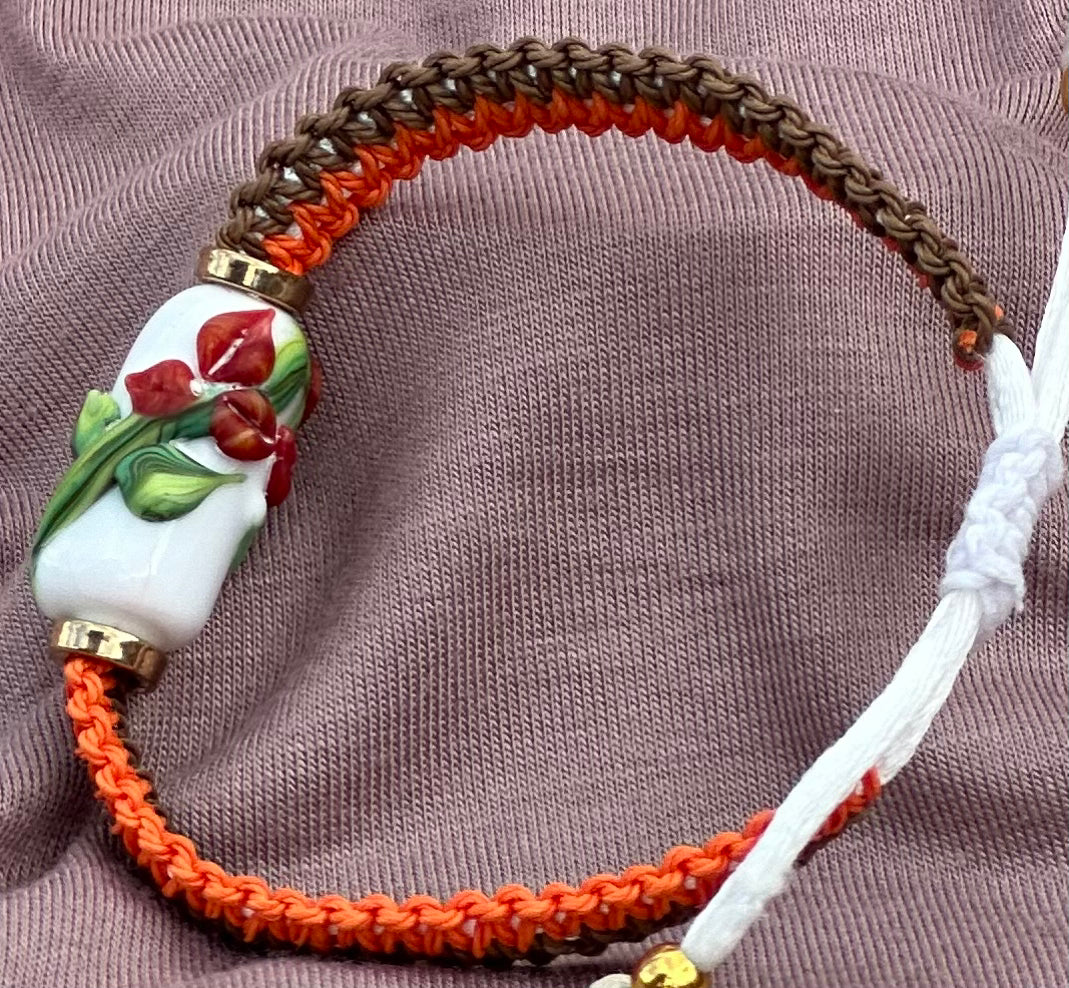 Dark Orange flowers with a brown & orange cord