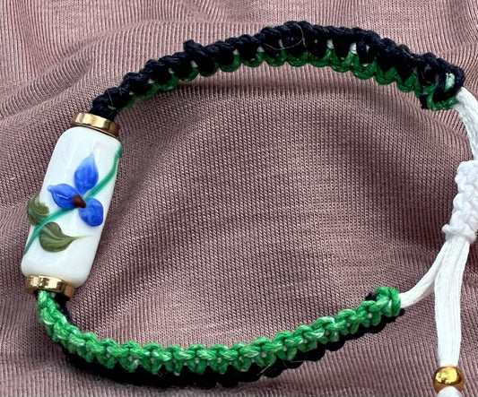 Blue flowers with a dark blue & green cord - Dr. Jen Jitsu