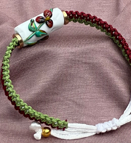 Dark Red flowers with a maroon & green cord - Dr. Jen Jitsu
