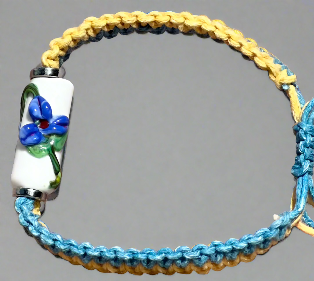 Blue flowers with a yellow & light blue cord