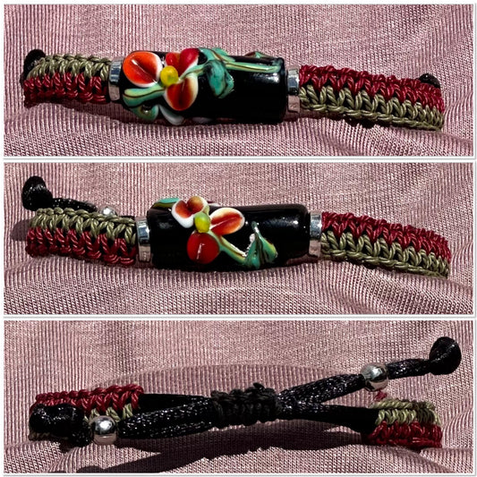 Red flowers with  maroon & dark green cord