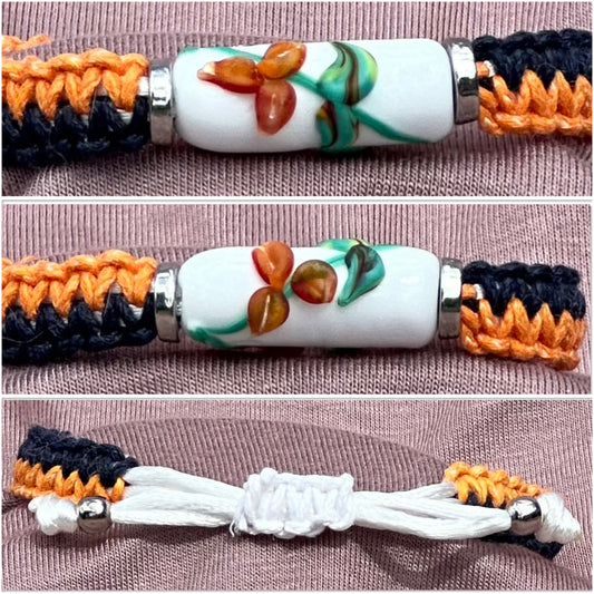 Orange flowers with orange & dark blue cord