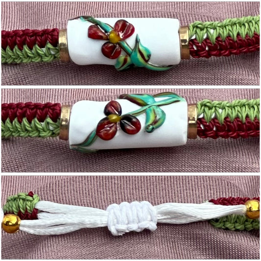 Dark Red flowers with a maroon & green cord