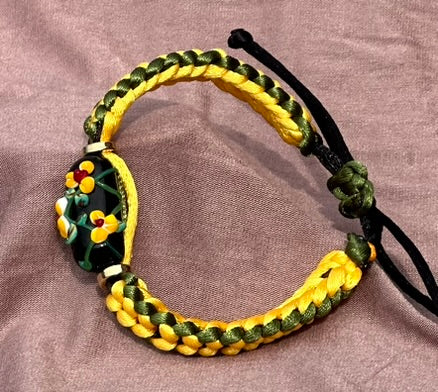 Yellow flowers on yellow & green cord