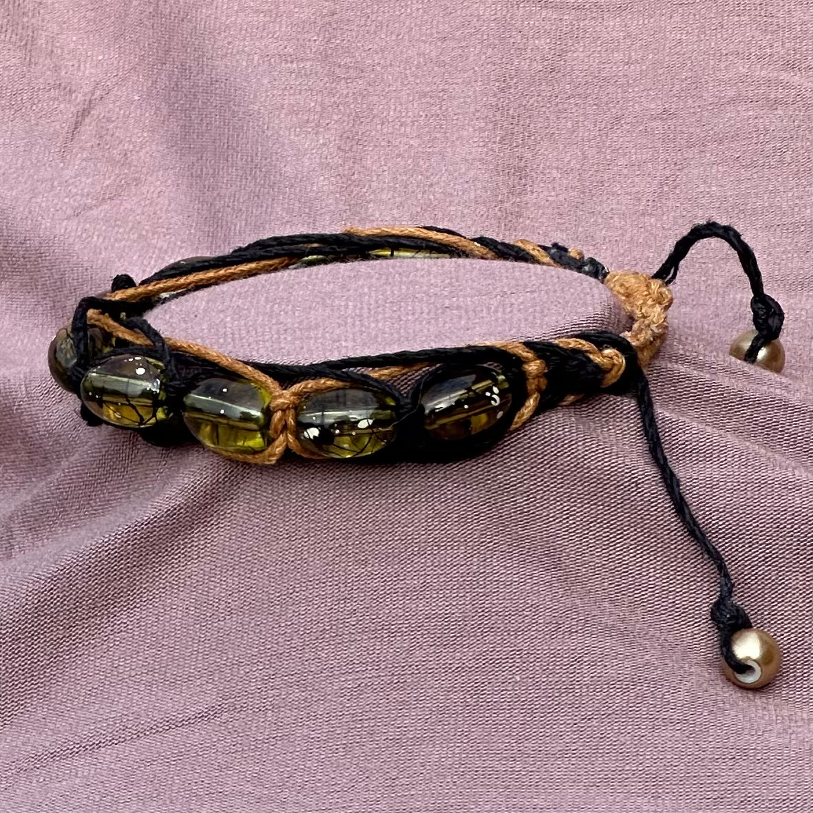 Bracelet featuring translucent beads with flecks of white