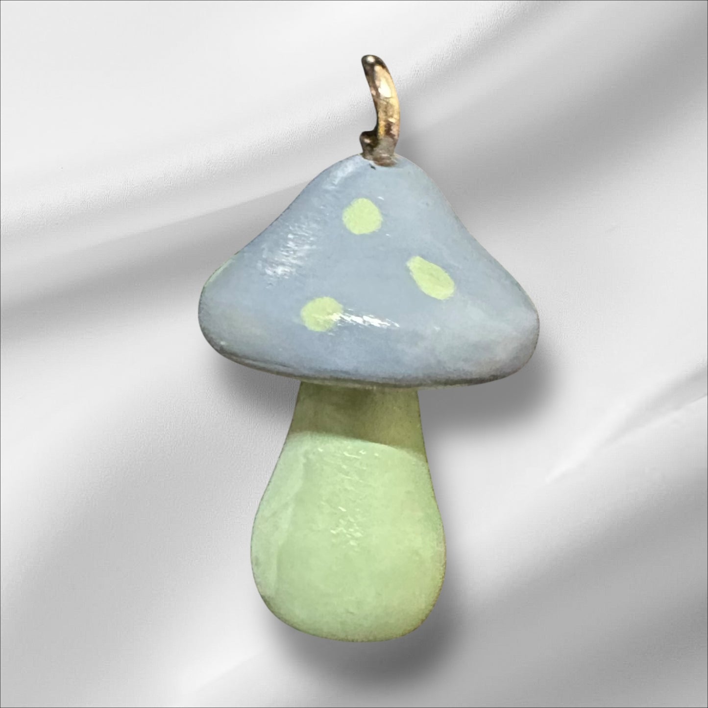 Blue stone and sage green mushroom