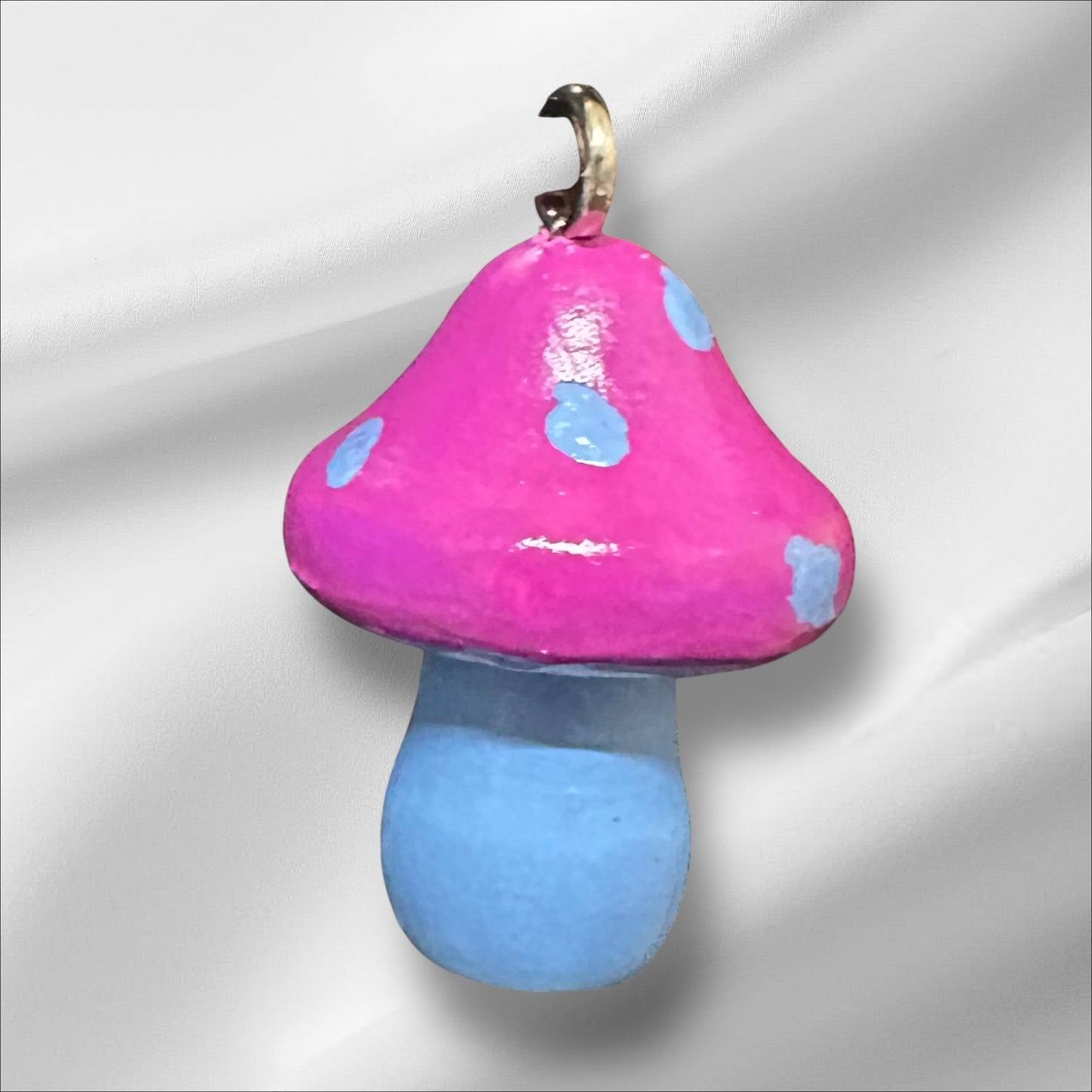 Fuchsia and light blue mushroom