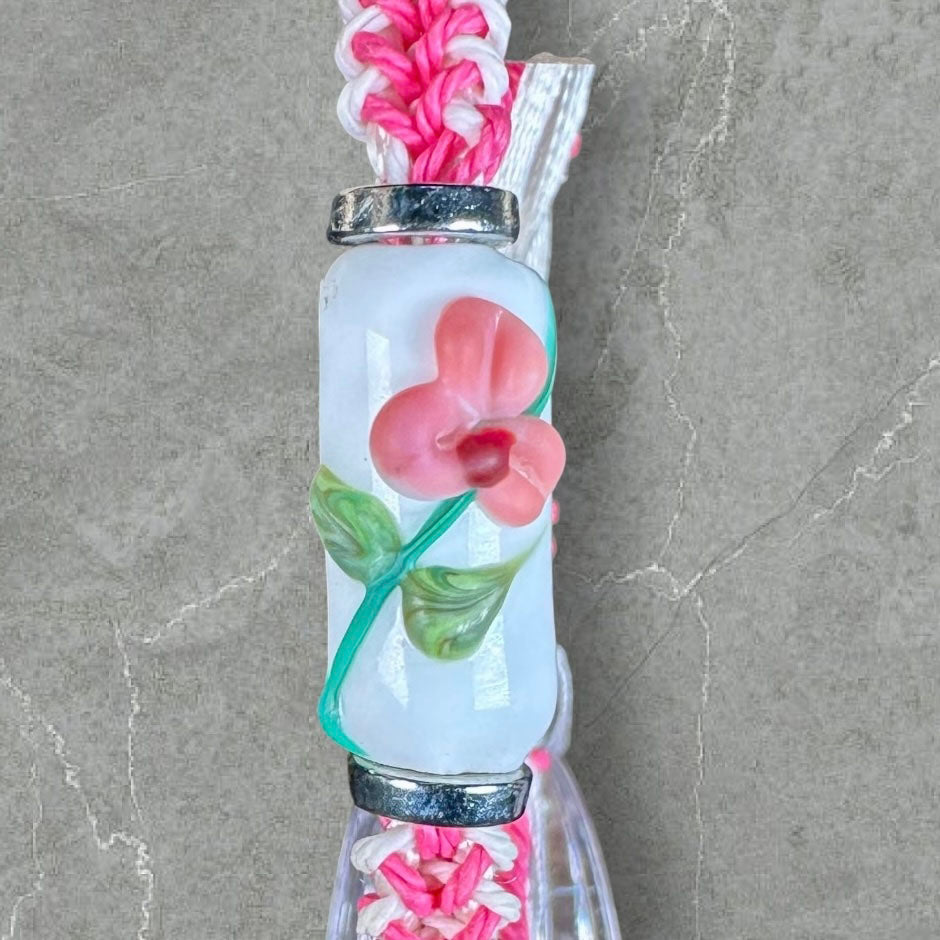 Pink flowers with a pink & white cord