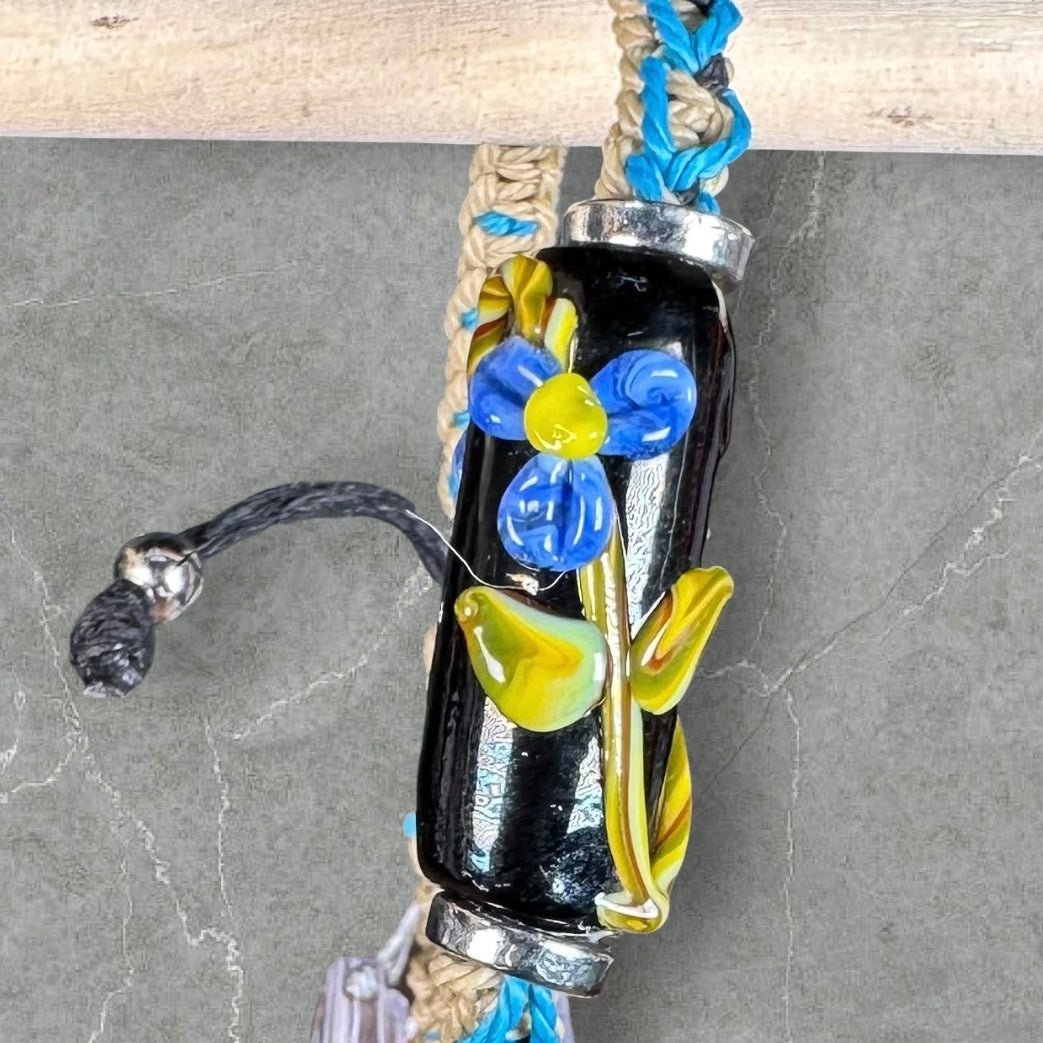 Blue flowers with a light brown & blue cord