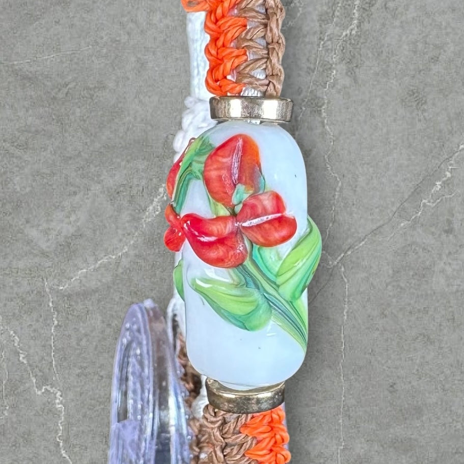 Dark Orange flowers with a brown & orange cord