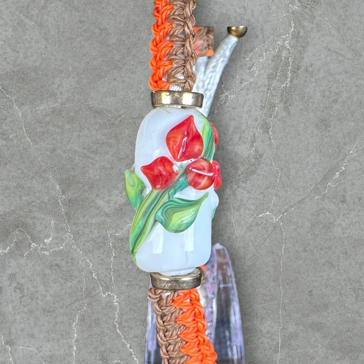 Dark Orange flowers with a brown & orange cord