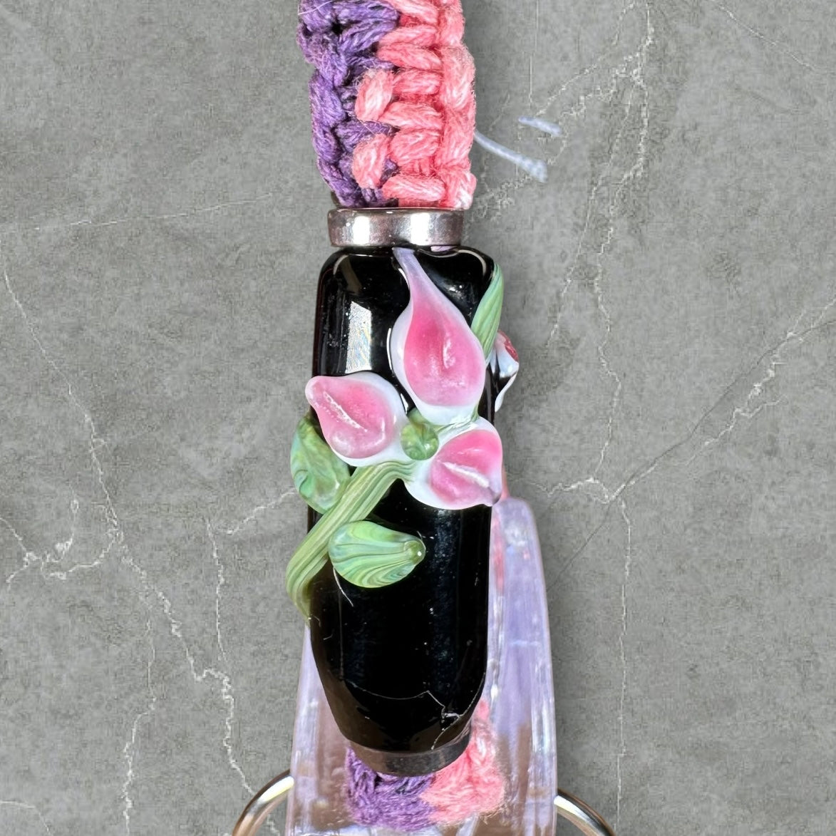 Pink flowers with pink & purple cord