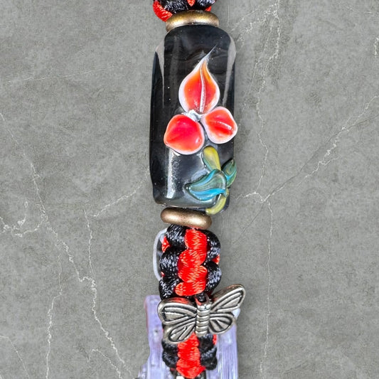 Red flower with silver butterflies