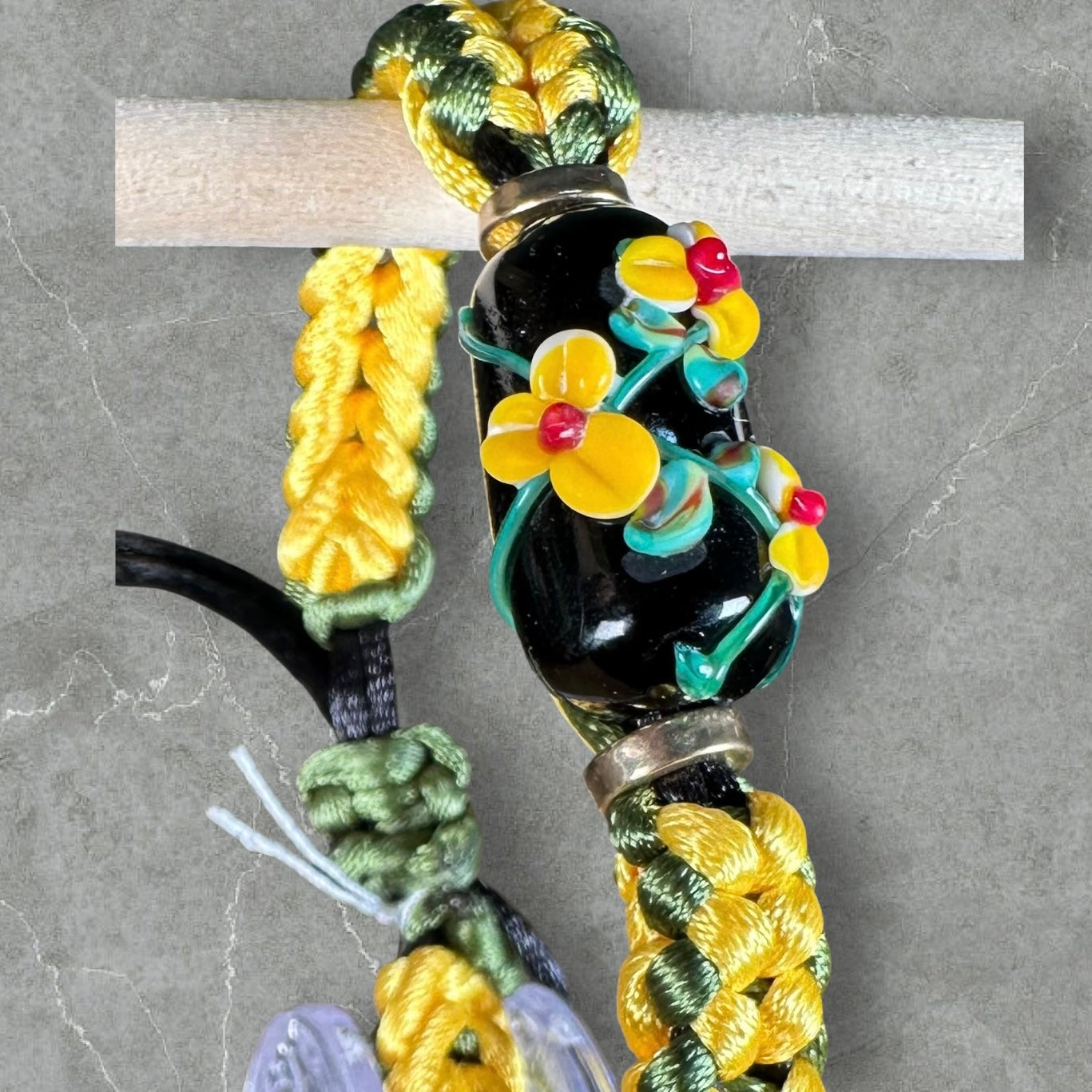 Yellow flowers on yellow & green cord