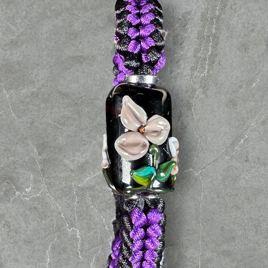 Purple flowers on purple & black cord